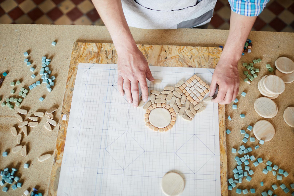 artist-creating-mosaic-in-studio-PFBZXA5.jpg