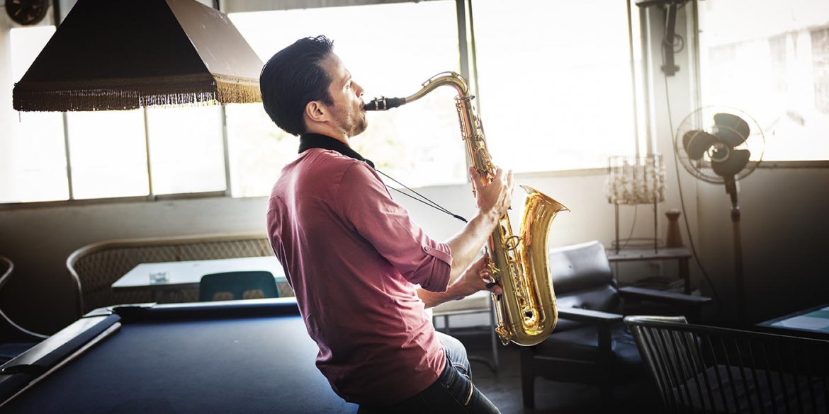 jazzman-musical-artist-playing-saxophone-concept-PYRJSRM.jpg
